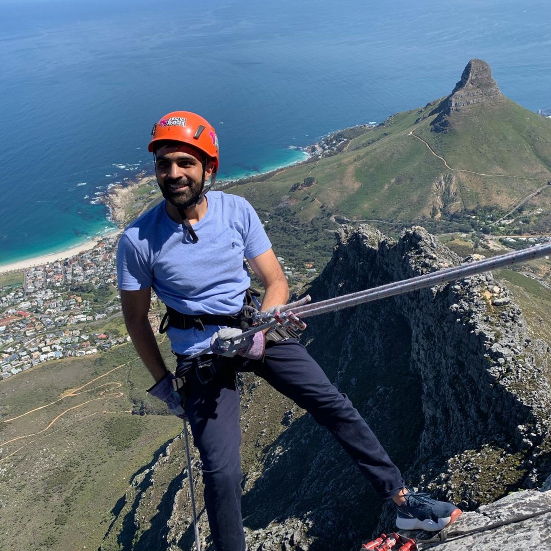 Jin abseiling off Table Mountain, Cape Town